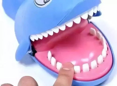按牙齿的鲨鱼玩具游戏,趣味牙齿探索游戏体验(图1) 按牙齿的鲨鱼玩具游戏,趣味牙齿探索游戏体验(图1)